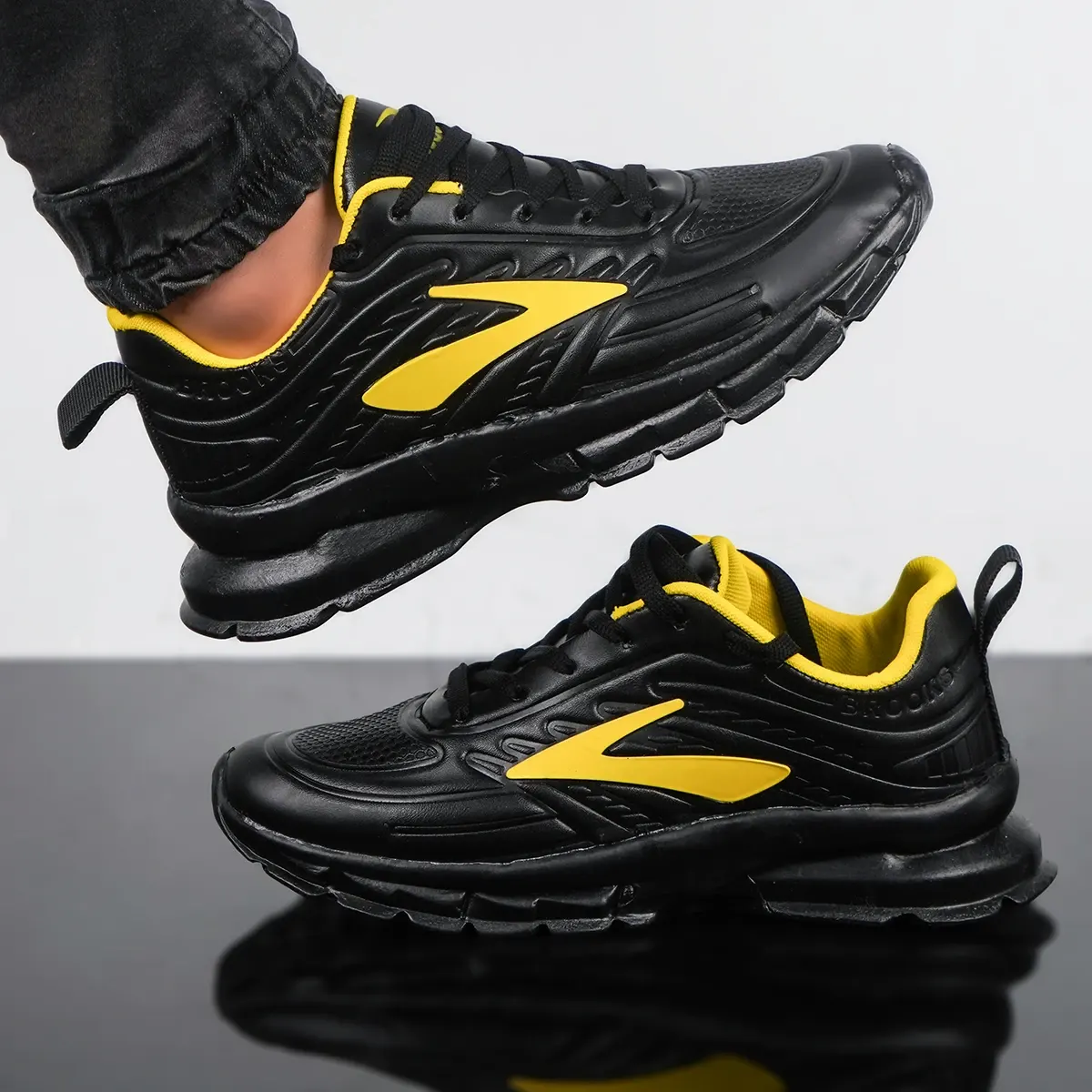 کفش ورزشی مردانه مشکی زرد مدل Padman
